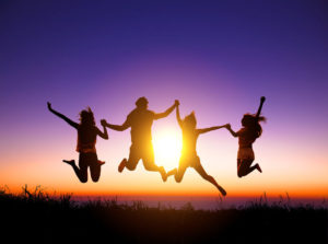 44685090 - group of happy young people jumping on the mountain